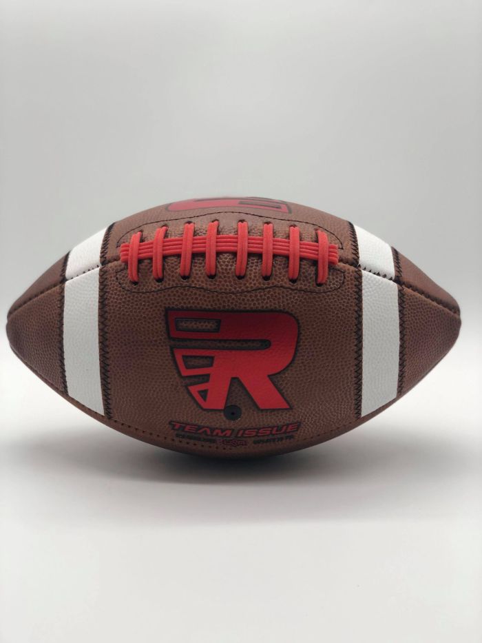Leather american game ball with red R logo and red lace in photobooth