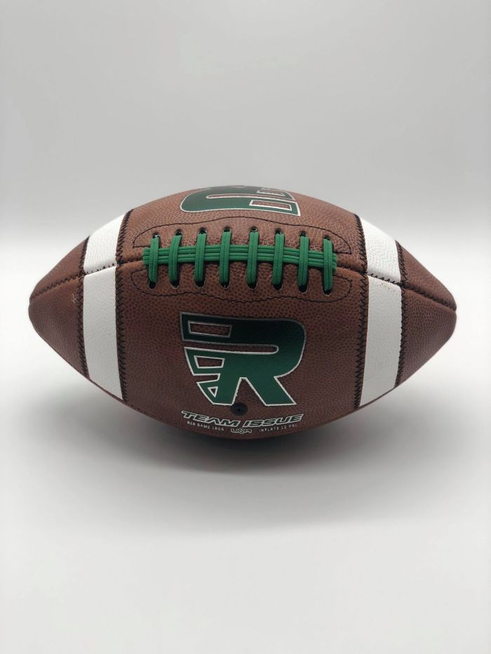Leather american game ball with green R logo in photobooth